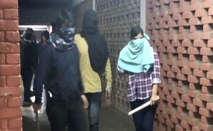 in JNU violence case police identify masked woman in video as DU student